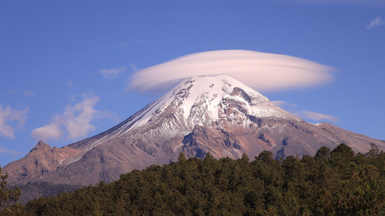 Pico de Orizaba, 5,636 m, under a lenticular cloud